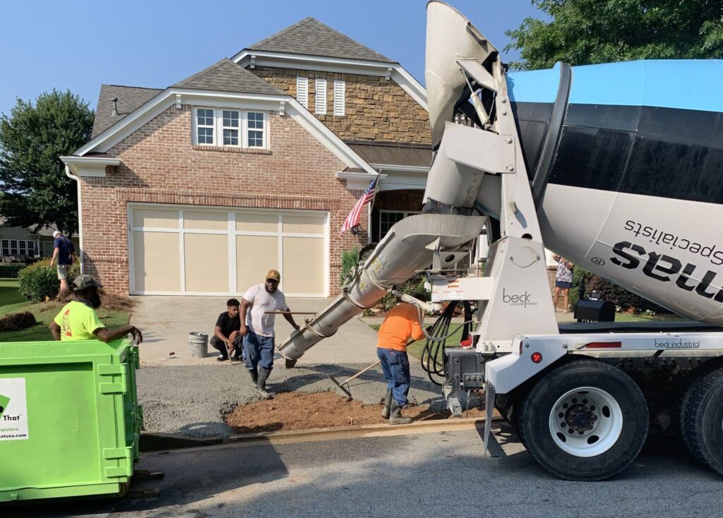 A concrete driveway being poured