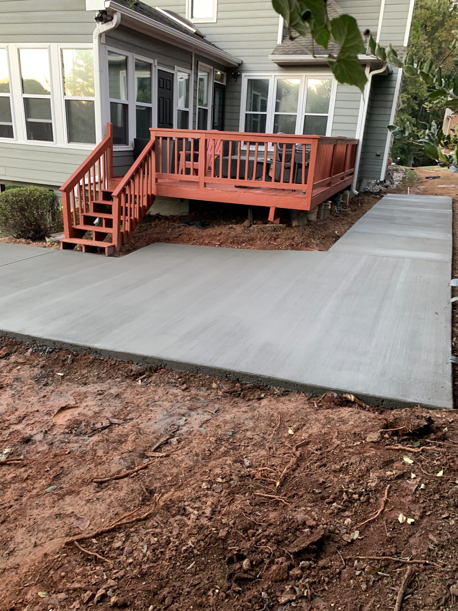 A freshly poured concrete walkway.